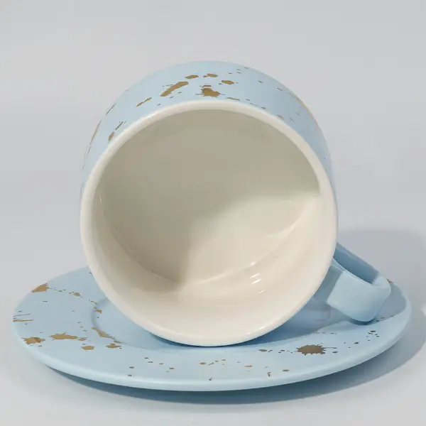 Keramische Kaffeetasse mit Untertasse mit Goldblatt für Kaffee- und Teeservice