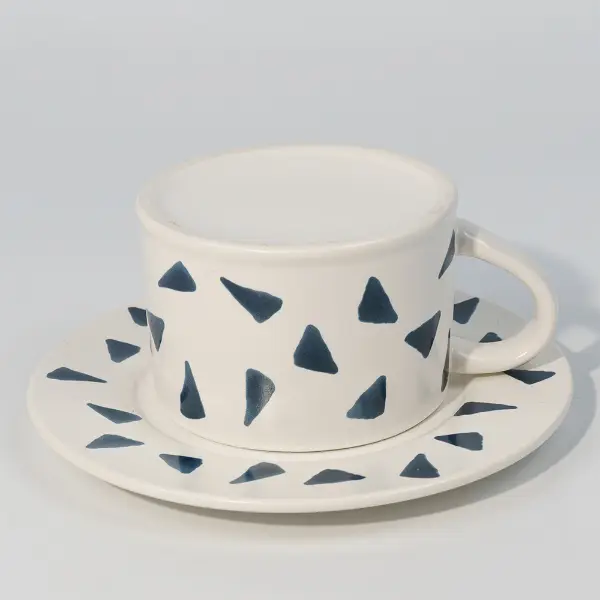 Draufsicht der bedruckten Keramik-Kaffeetasse mit Untertasse zum Kaffeeservieren